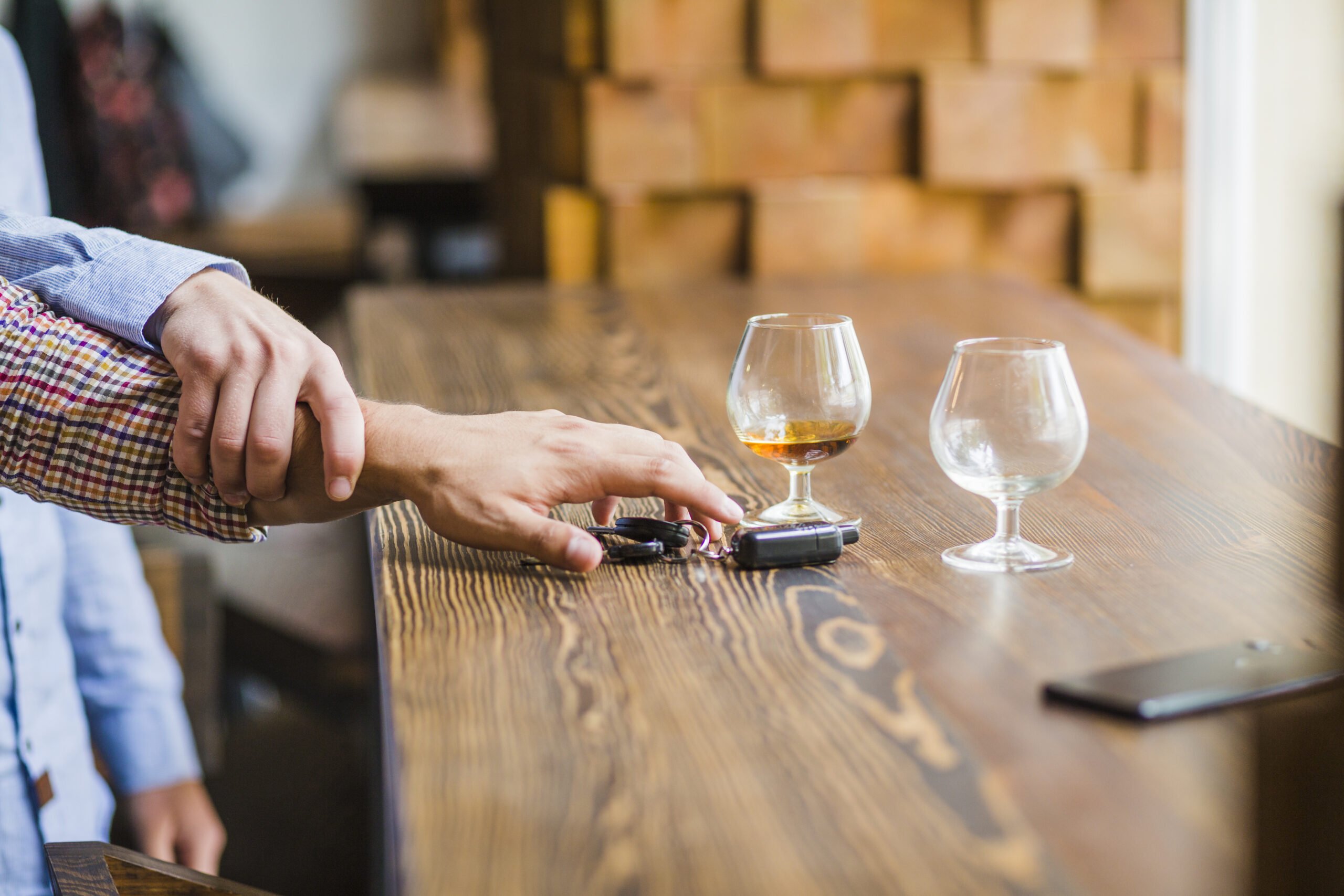 man avoiding her friend taking car keys