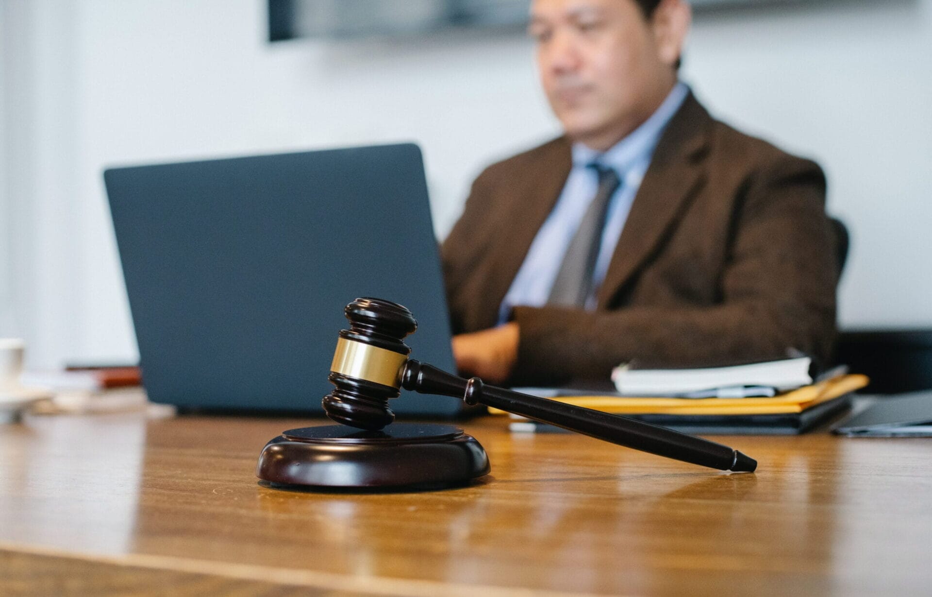 Lawyer working on his computer. The Law Offices of Nicholas Parr is the best option for you.