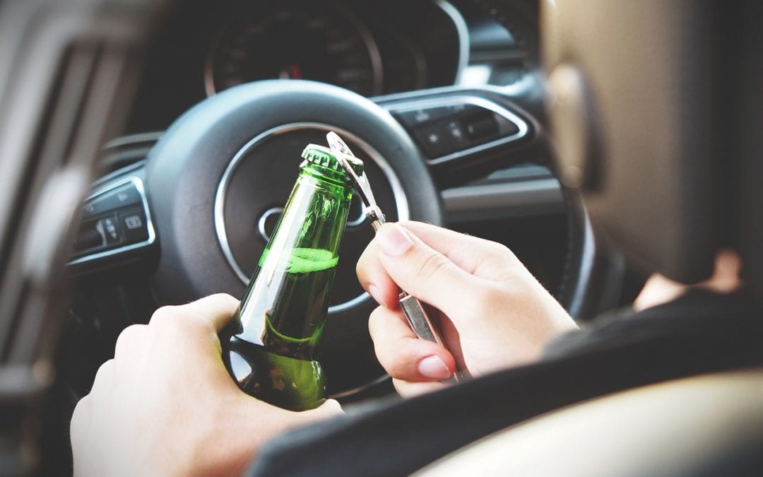 Person drinking while driving.
